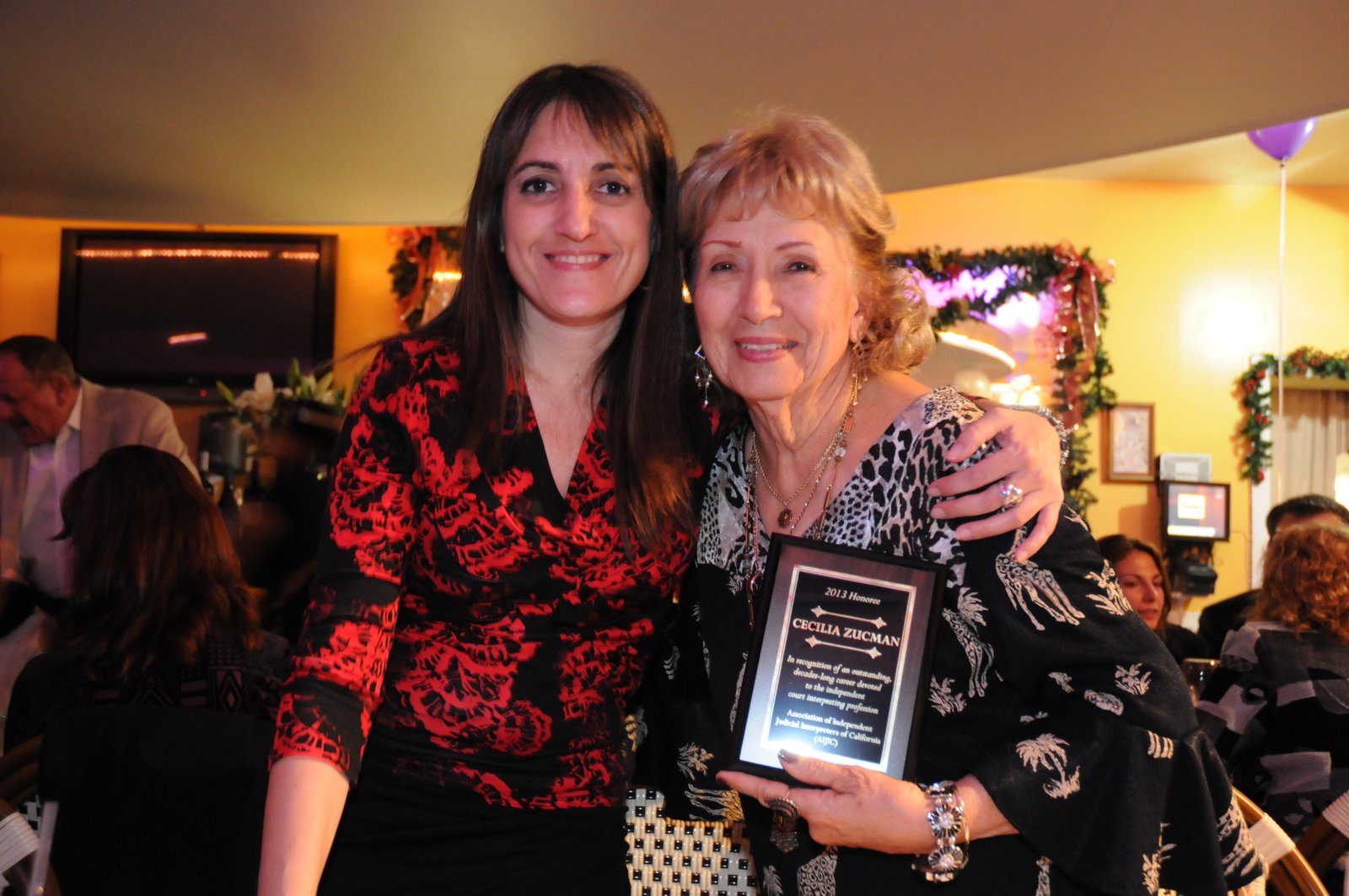 Mom receiving her lifetime achievement award from the new Interpreter's Association